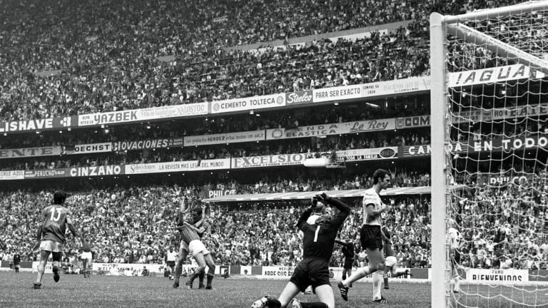 Gianni Rivera scores Italy's winning goal in the 1970 semi-final against West Germany